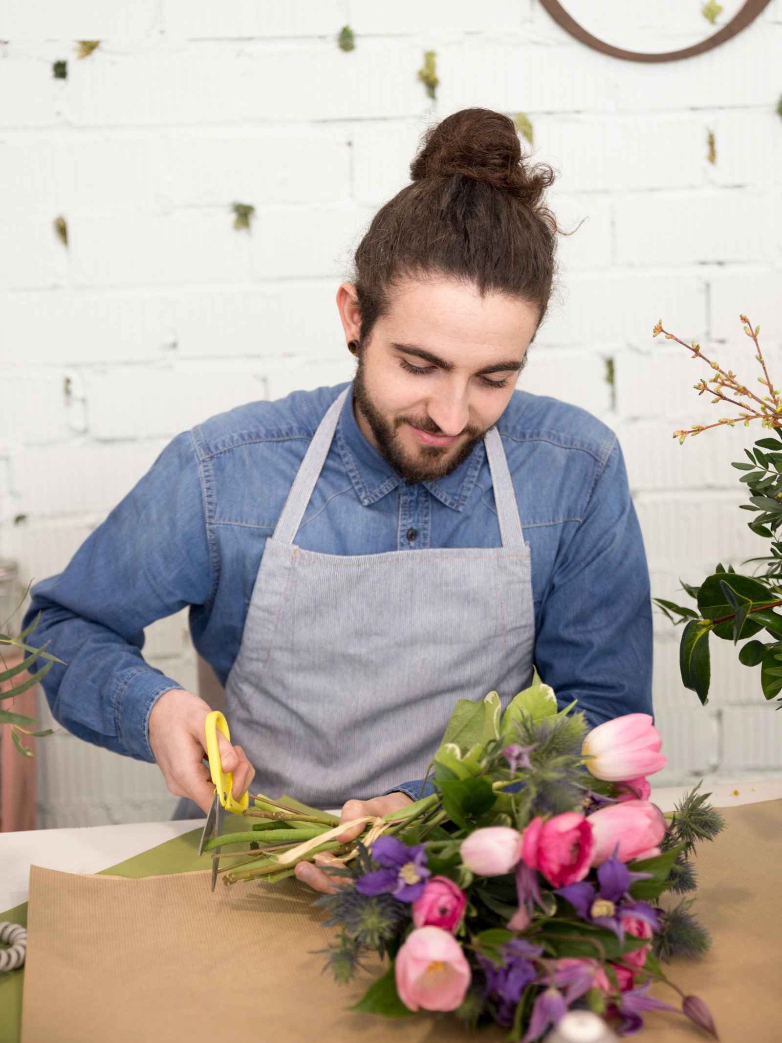 Florist preparing bouquets for the day's delivery route